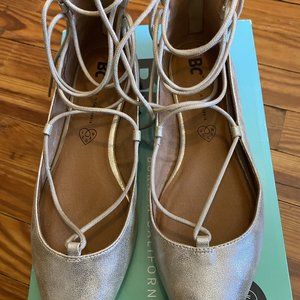 Born in California gold lace-up flats